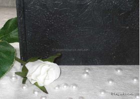 Journal | Embossed Bloom Onyx Black, 50 blank, unlined smooth white pages with hard cover. A4 Landscape orientation. Also used as a Guest Book and Photo album-closeup | PaperSource