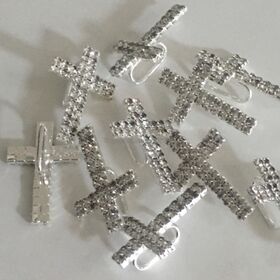 Diamante Cross T-103 with double row of diamantes and a bar on back to slide ribbon. Perfect for Baptisms, Communions and other religious events. Diamante Cross T-103 with double row of diamantes and a bar on back to slide ribbon. Perfect for Baptisms, Communions and other religious events.