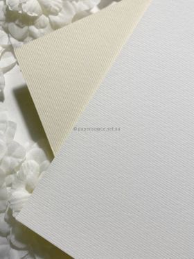 Ultrafelt Soft Ivory (at left). A Matte, Laser Printable A4 270gsm Card | PaperSource