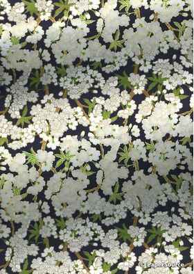 Chiyogami | Floral 45 Japanese handmade, screen printed paper with white blossoms, green leaves outlined in gold on black background-curled | PaperSource